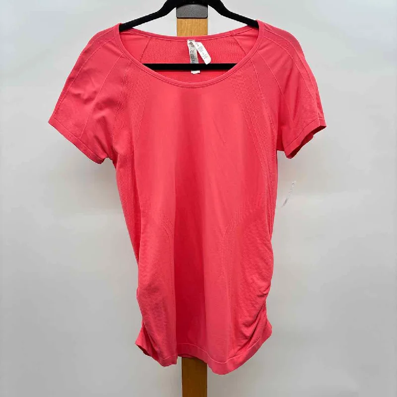 trendy women's topsAthleta Women's Size XL coral Solid Short Sleeve Shirt