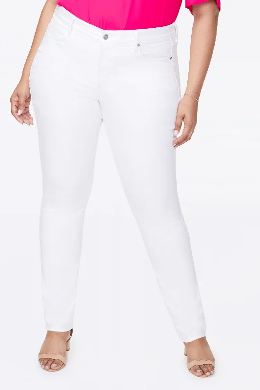 women's denim jeans with raw hemsAlina Skinny Jeans In Plus Size - Optic White